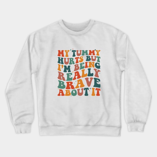 My Tummy Hurts But I'm Being Really Brave About It Retro Crewneck Sweatshirt by Nisrine